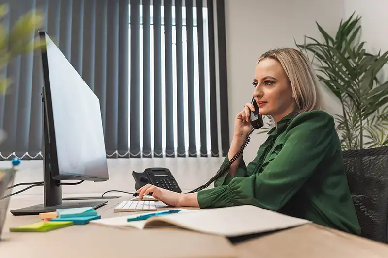 Woman using Poly IP Phones